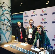RUBIX team on stage at a branded industry event