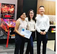RUBIX colleagues receiving an award certificate