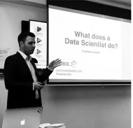A RUBIX data scientist presenting What does a data scientist do